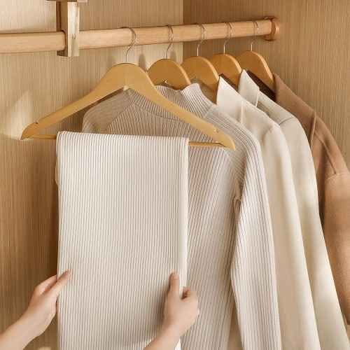 Organize your wardrobe with our premium wooden hangers